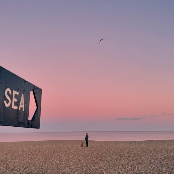 The Sea sign on Aldeburgh beach at dusk